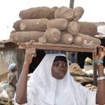 realyams A woman carrying real yams.