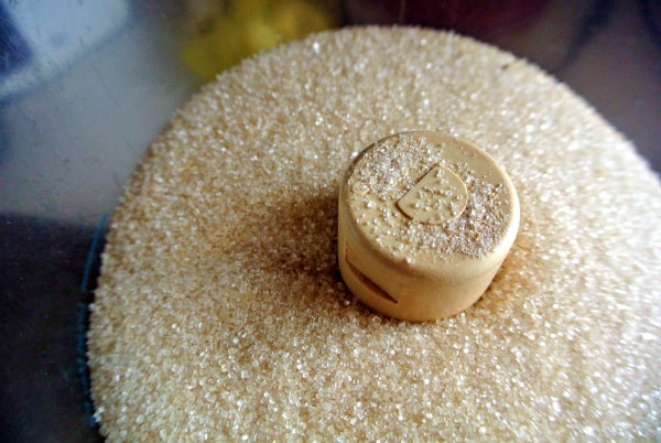 Zulka Morena cane sugar in the bowl of a food processor.