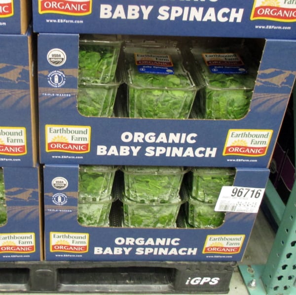 A box display of Earthbound Baby Spinach at Costco