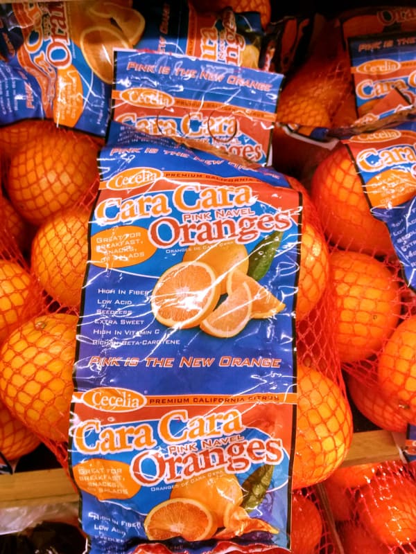 Bags of Ceclia brand Cara Cara oranges.