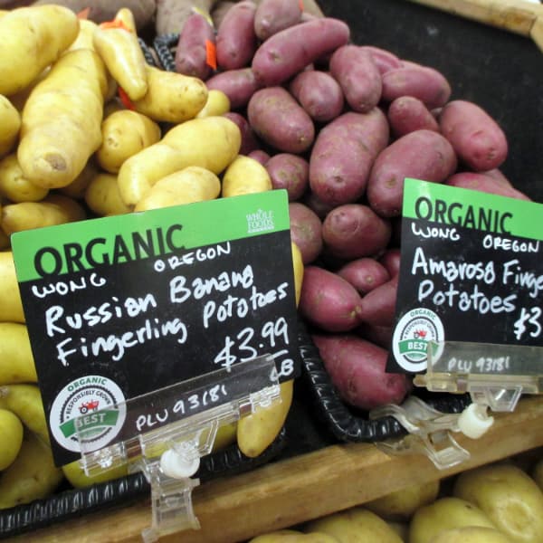 A display of Russian Banana and Amarosa Fingerling potatoes at Whole Foods Market. 