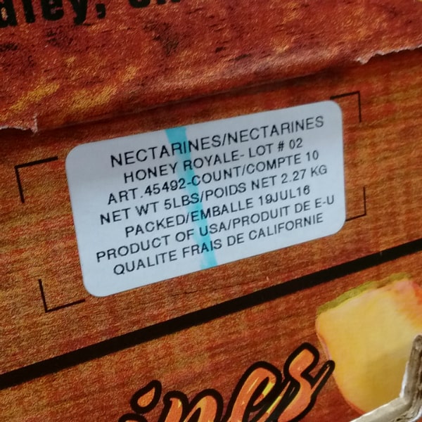 Label on this box of nectarines showing the variety.