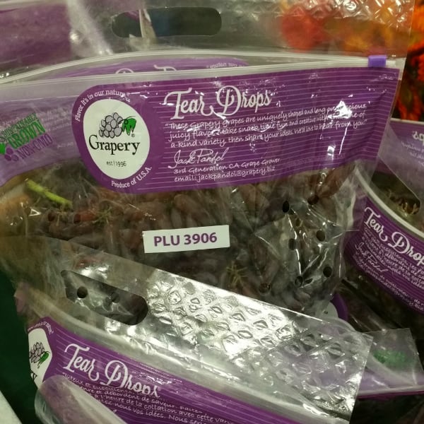 Bags of Grapery Tear Drops grapes on a grocery display
