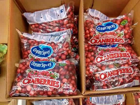 A box of Ocean Spray fresh cranberry bags.