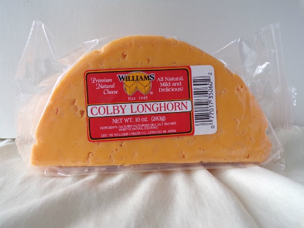 Williams Colby Longhorn in package in front of a white background.