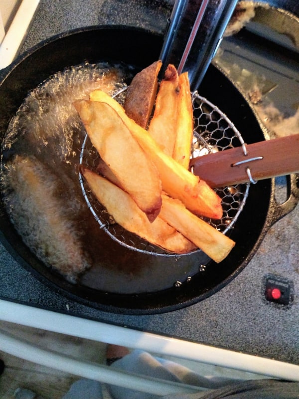 fries coming out of oil.