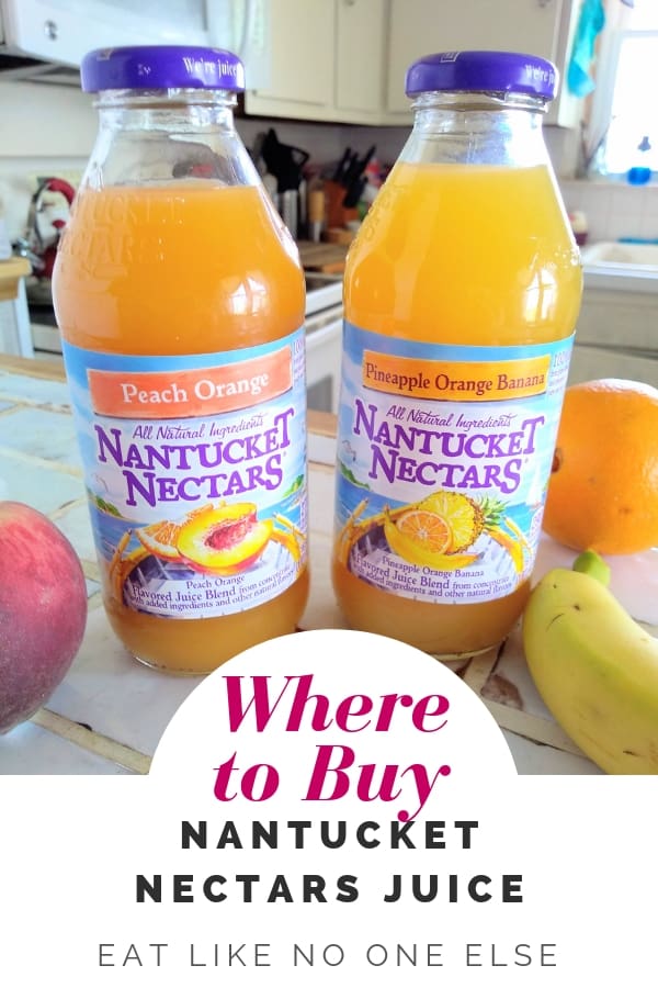 Two bottles of Nantucket Nectars sitting on a counter in a white kitchen with the words "Where to Buy Nantucket Nectars Juice" at the bottom.