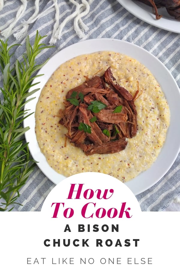 Bison pot roast meat on top of yellow grits in a white bowl with the words "How to Cook a Bison Chuck Roast" underneath.