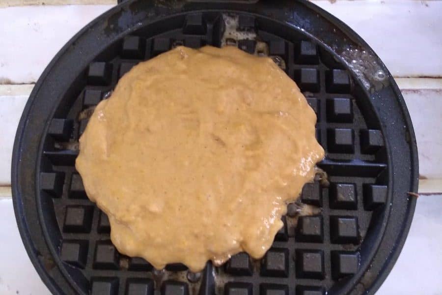 ⅓ cup of waffle batter in center of waffle iron