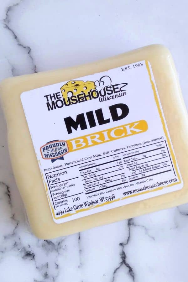 A chunk of Mild Brick cheese from the Mousehouse Wisconsin.