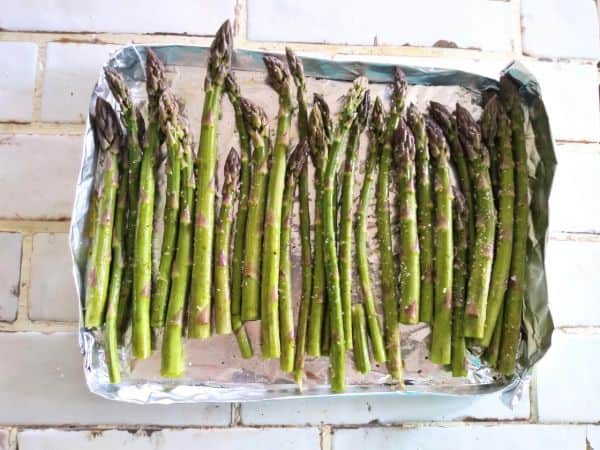 asparagus in a single layer on a homemade foil tray