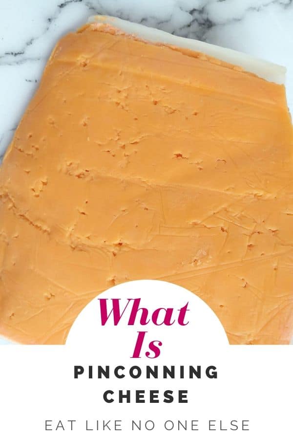 A wedge of Pinconning cheese with the title over it "What is Pinconning cheese"