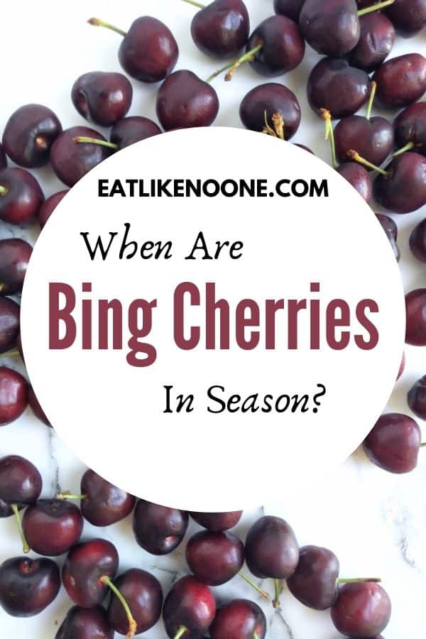 Bing cherries on a white background with a logo in front that reads when are Bing Cherries in Season?