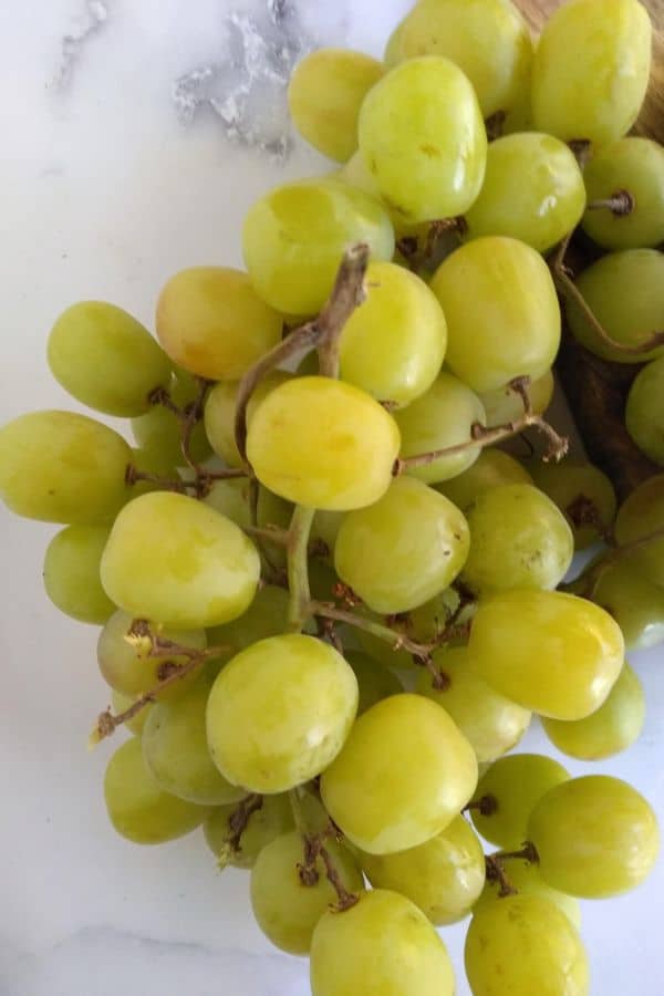 Grapery Green Limited grapes on a white background