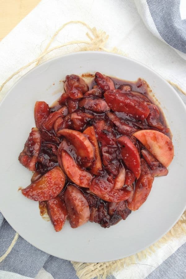 Fried Pink Pearl apples on a gray plate