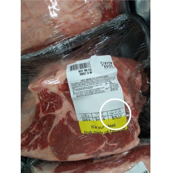 A Rib Eye shown with a white circle around the date that says freeze by Dec 21st.