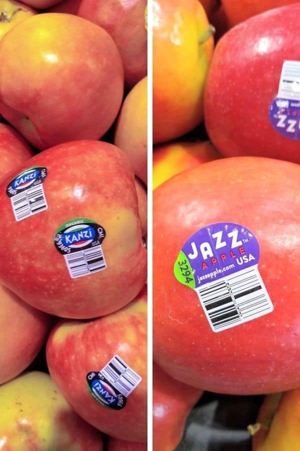 A display of Kanzi apples is pictured next to a display of Jazz apples.