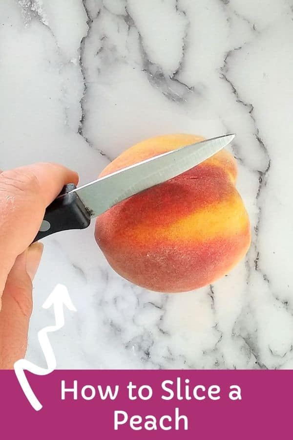 A peach sitting on a white board with black streaks. A knife is sitting on top of the peach, ready to cut into it. The words at the bottom read "How to slice a peach" with a up arrow next to the words.