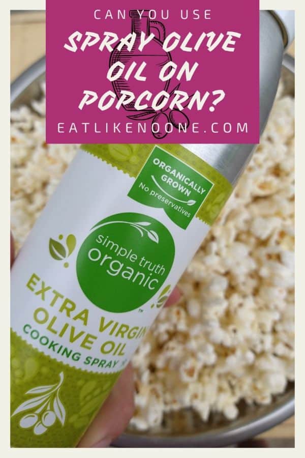 A bottle of Simple Truth Organic Spray Olive Oil over top of a bowl of popcorn with the words "Can You Use Spray Olive Oil on the Popcorn?" on top.