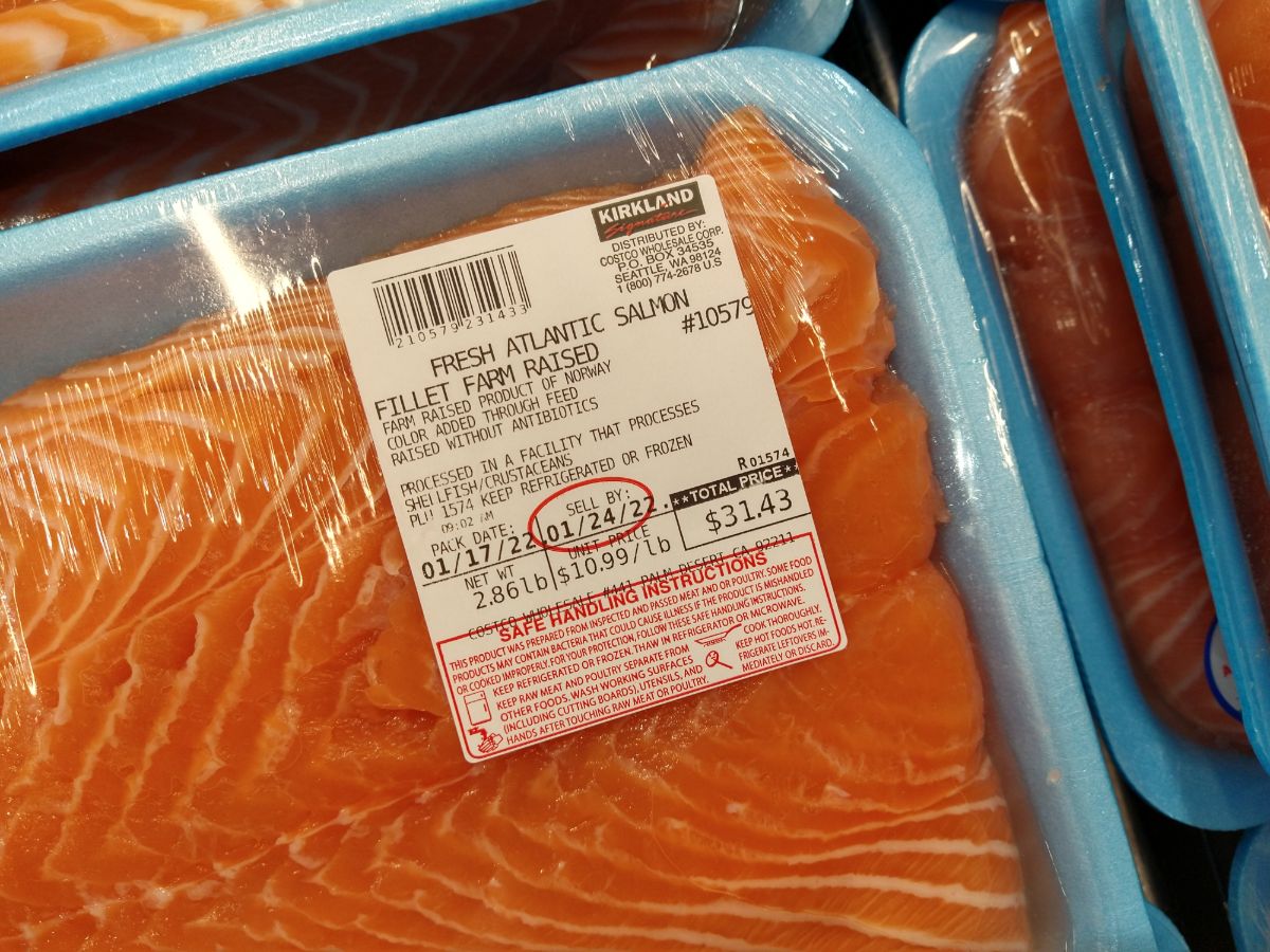 A close up of a label Fresh Farmed raied Atlantic Salmon Filet at Costco