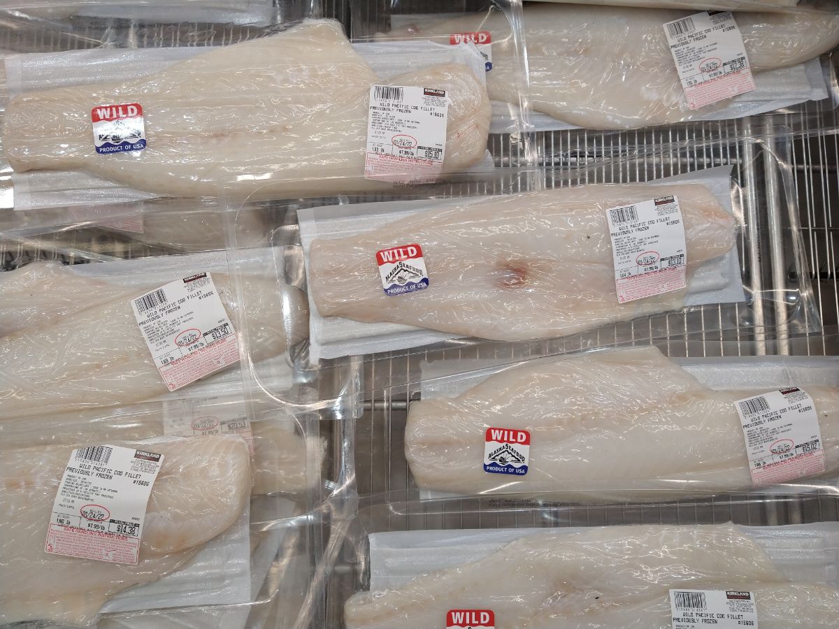 Vacuum sealed previously frozen wild Pacific cod in a display case