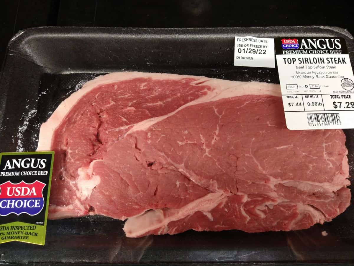 A packaged Angus USDA Choice Top Sirloin steak at a Walmart store selling for $7.44/lb.