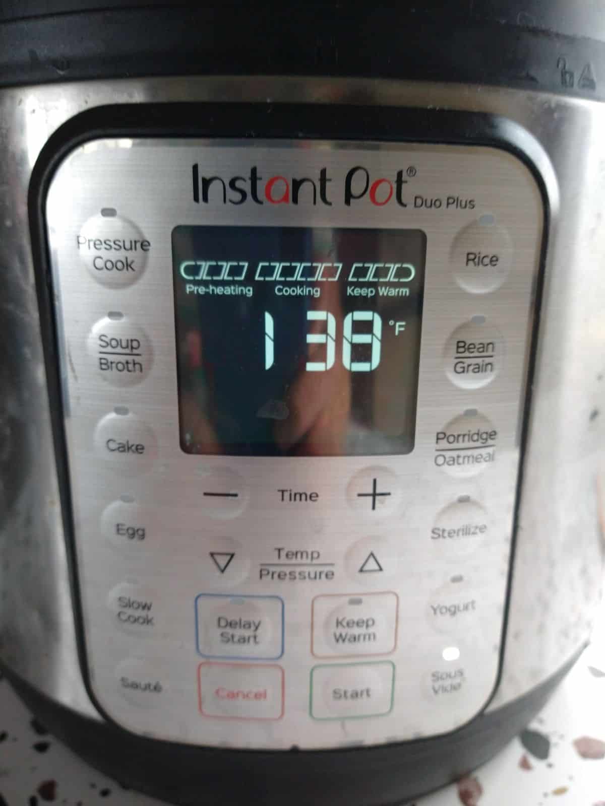 The Instant Pot Duo Plus set to 138 degrees for sous vide cooking.