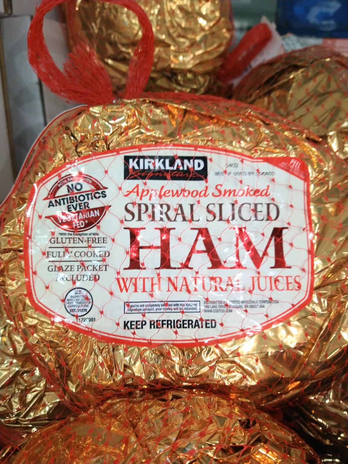 Kirkland Applewood Smoked Spiral Sliced Ham in gold foil.