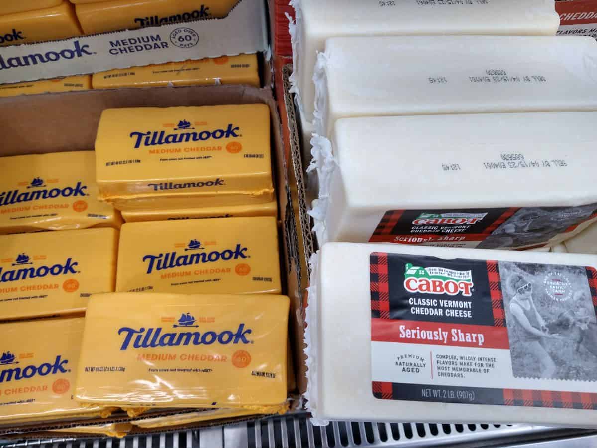 Blocks of Tillamook Medium cheddar and Cabot Seriously sharp cheddar right next to each other. 