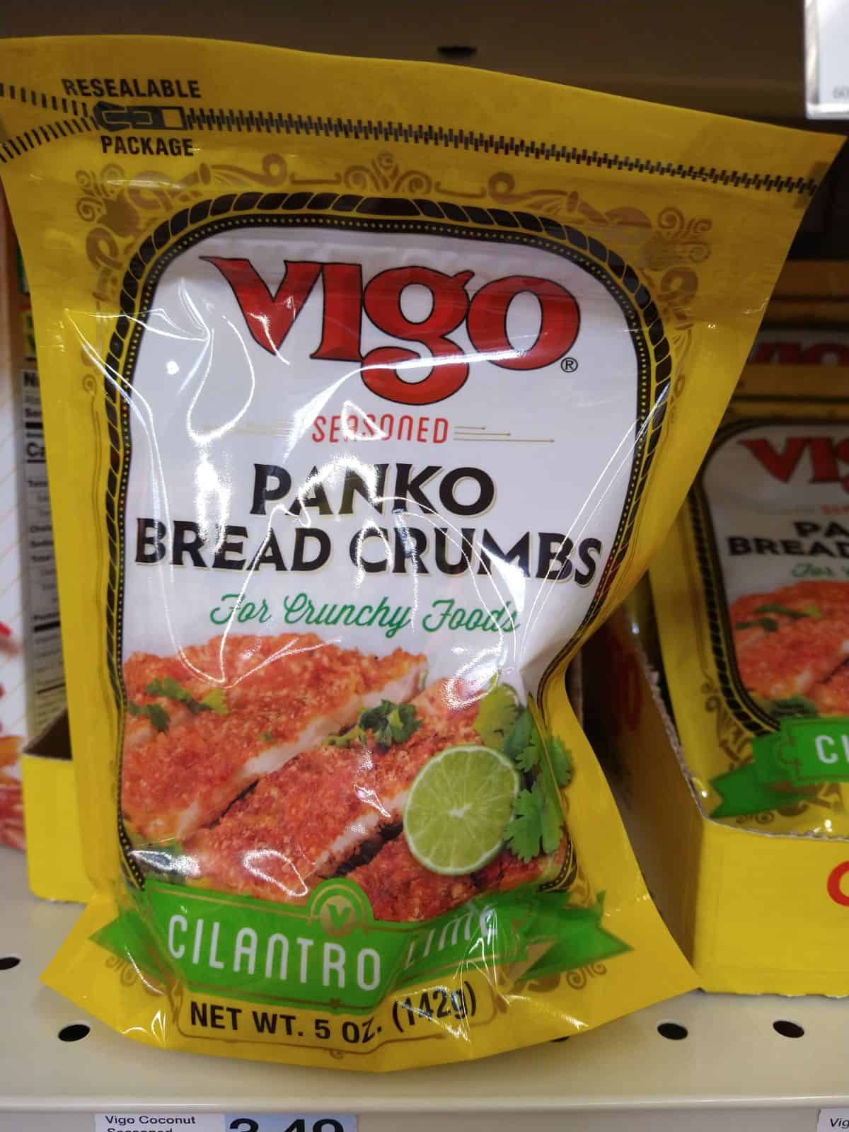 A yellow bag of Vigo Cilantro Lime Seasoned Panko breadcrumbs on the shelf at a grocery store.