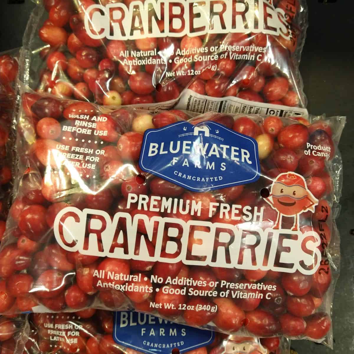 Bags of Bluewater Farms Cranberries at the grocery store.