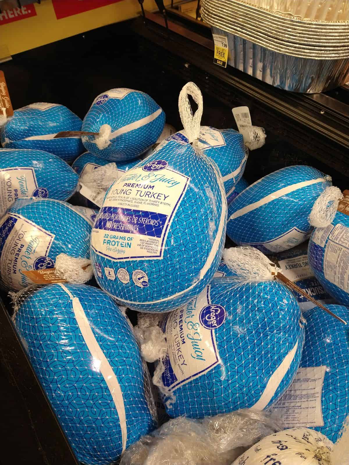 Kroger frozen turkeys in blue packaging on display after Thanksgiving Day.