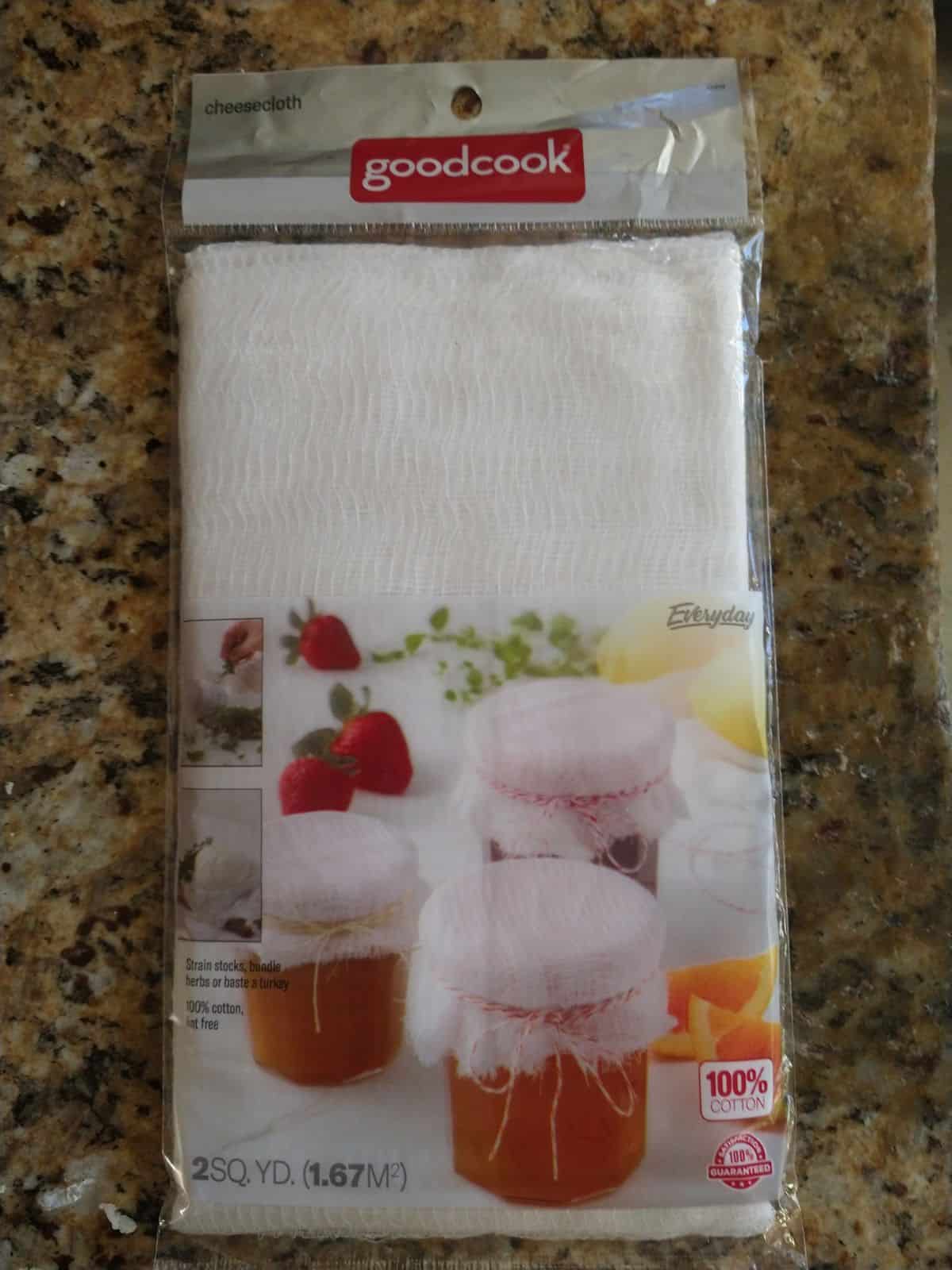A package of Goodcook cheesecloth sitting on a granite countertop.