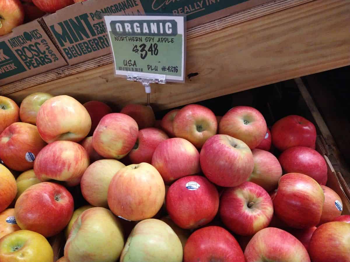 A display of Organic Heirloom Northern Spy apples selling for $3.48/lb.