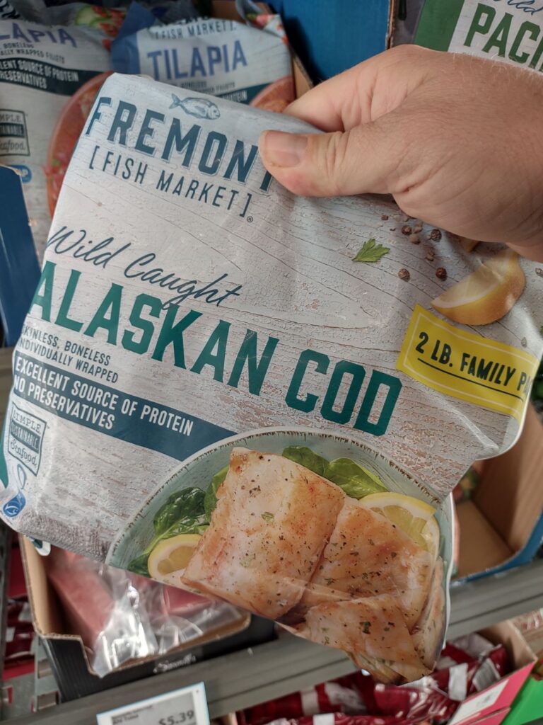 Bags of Wild Caught Alaskan Cod at an ALDI store.