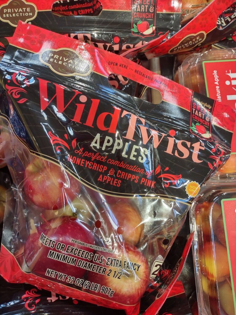 A bag of Private Selection branded WildTwist apples.