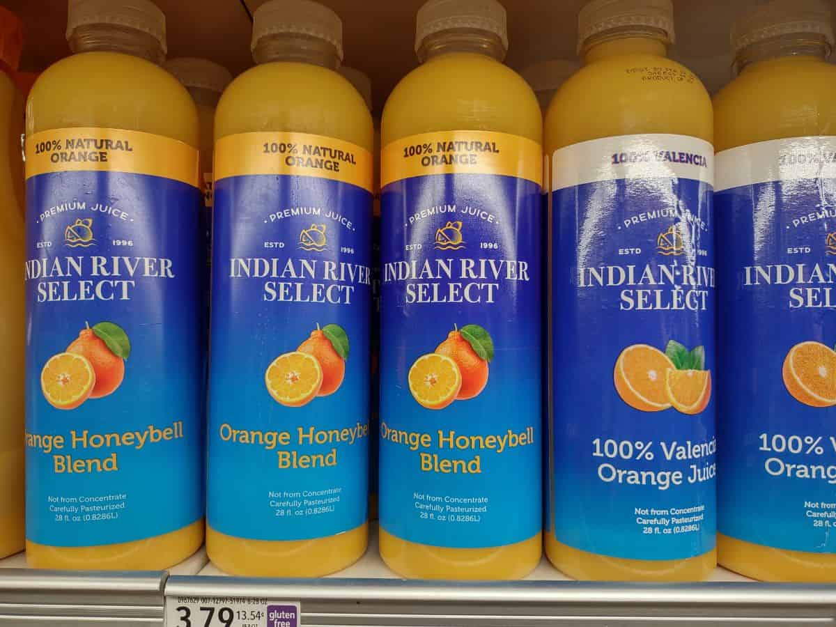 Bottles of Indian River Select 100% natural orange juices at the grocery store.