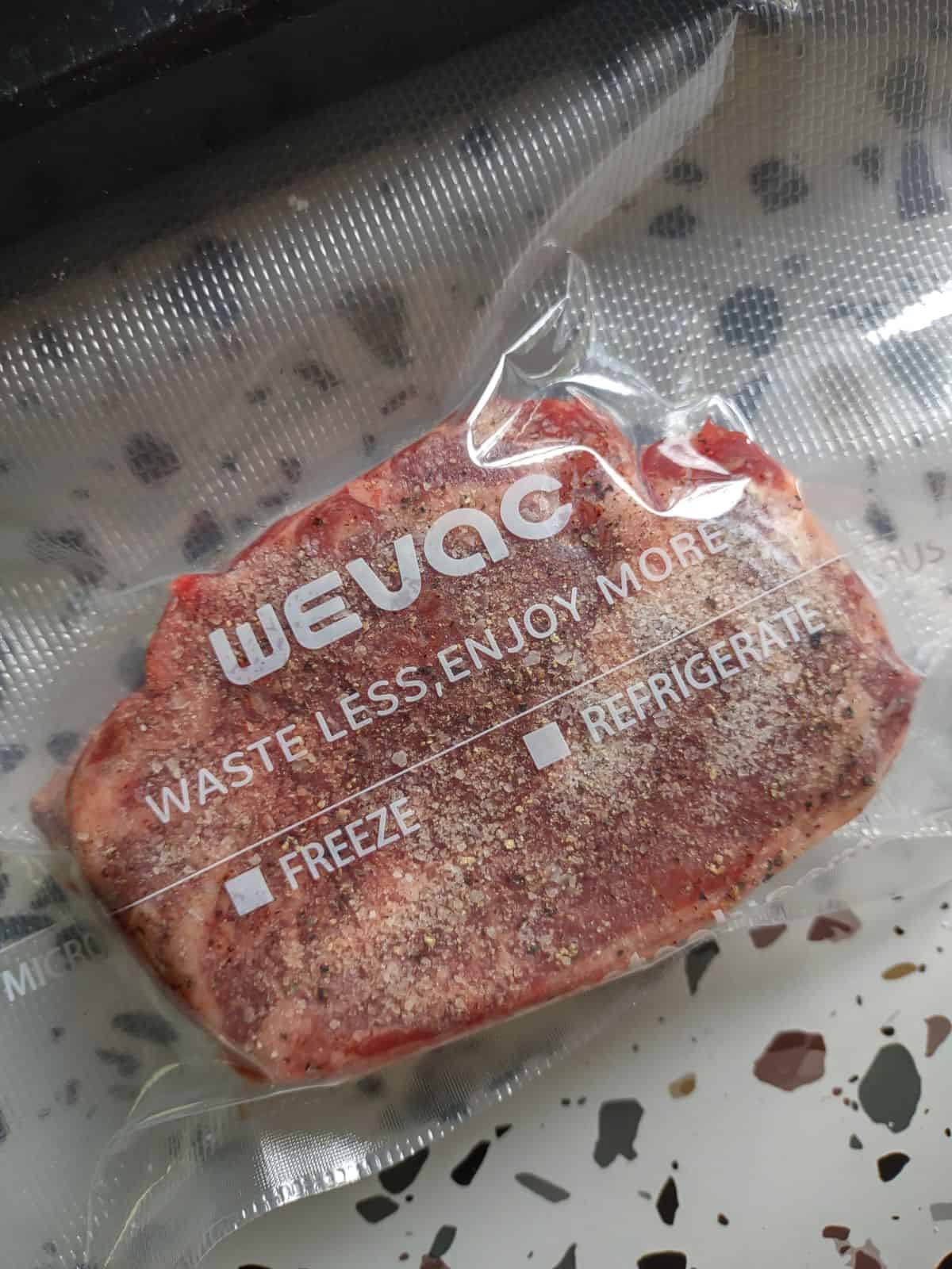 A Chuck Eye steak sealed in a WeVac bag.