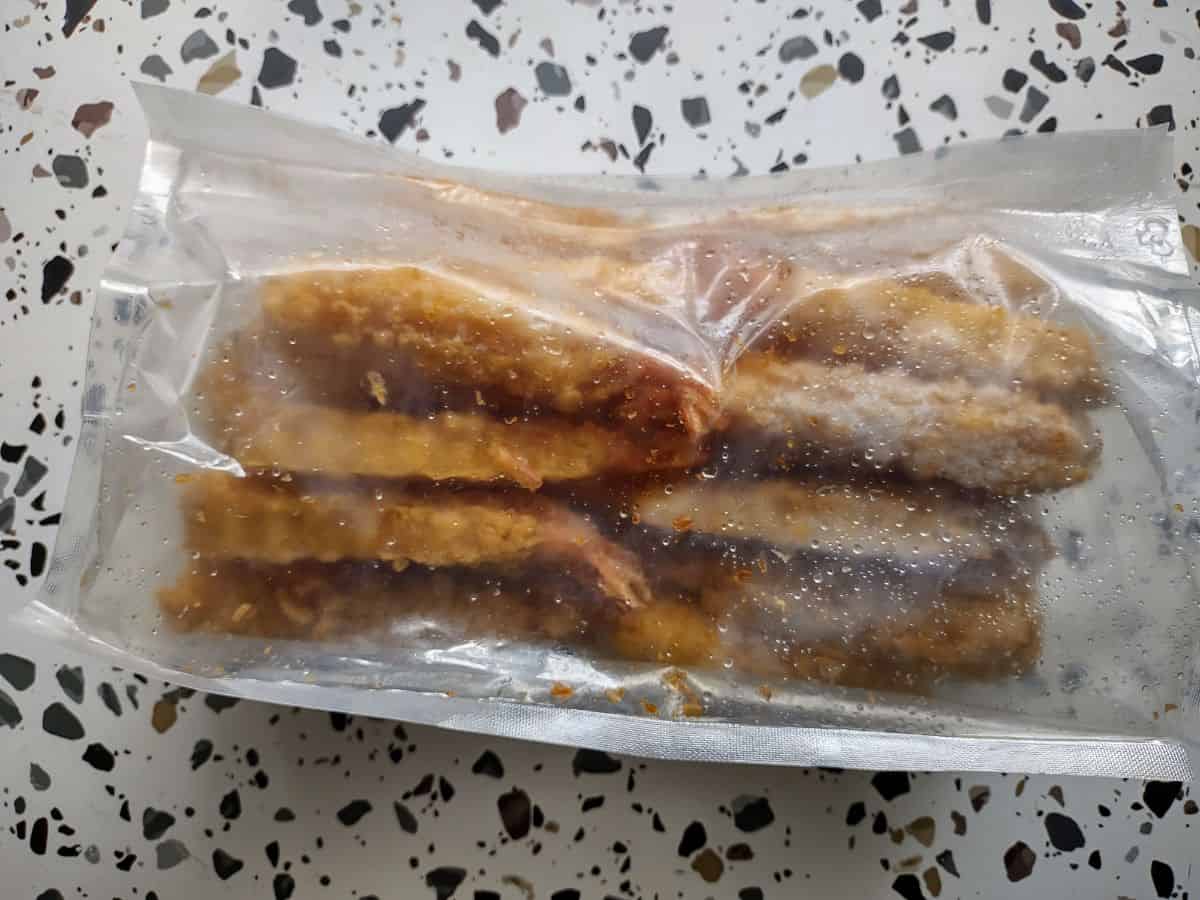 A plastic bag of  Kirkland Tempura Shrimp