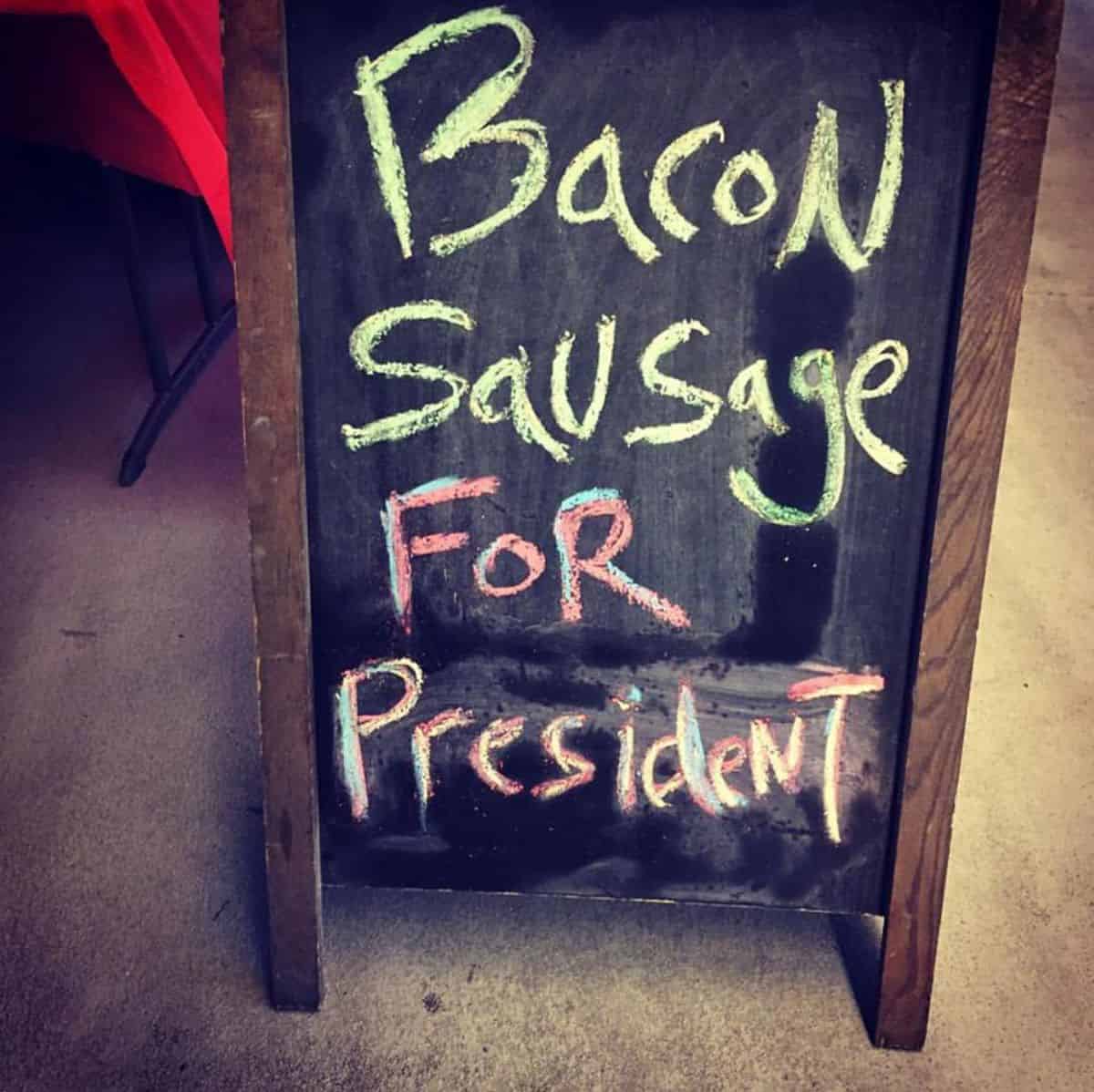 A sign that reads Bacon Sausage for President.