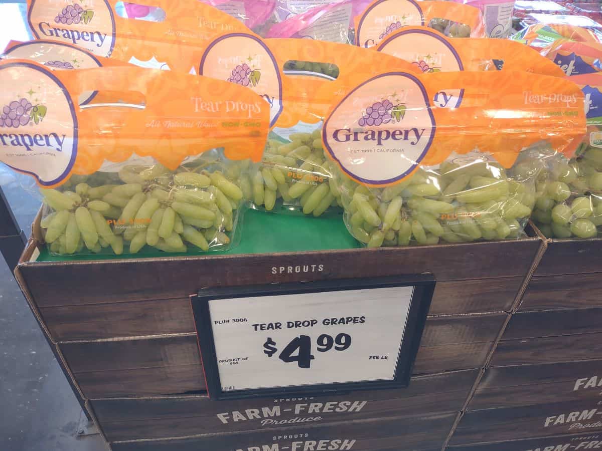 A display of Green Tear Drops grapes at a Sprouts store. 