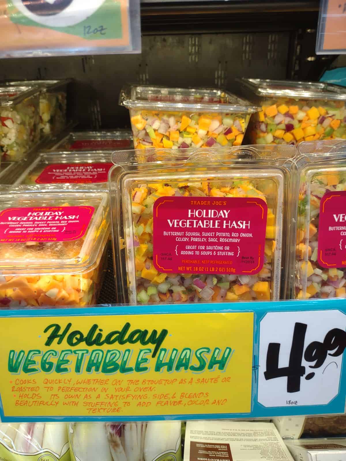 A pound containers with a holiday vegetable hash in them. 