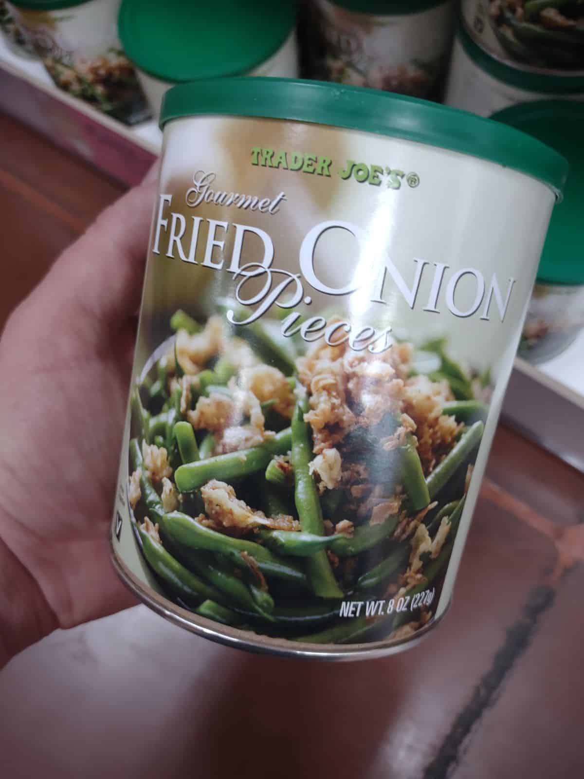 A canister of Trader Joe's fried onion pieces. 