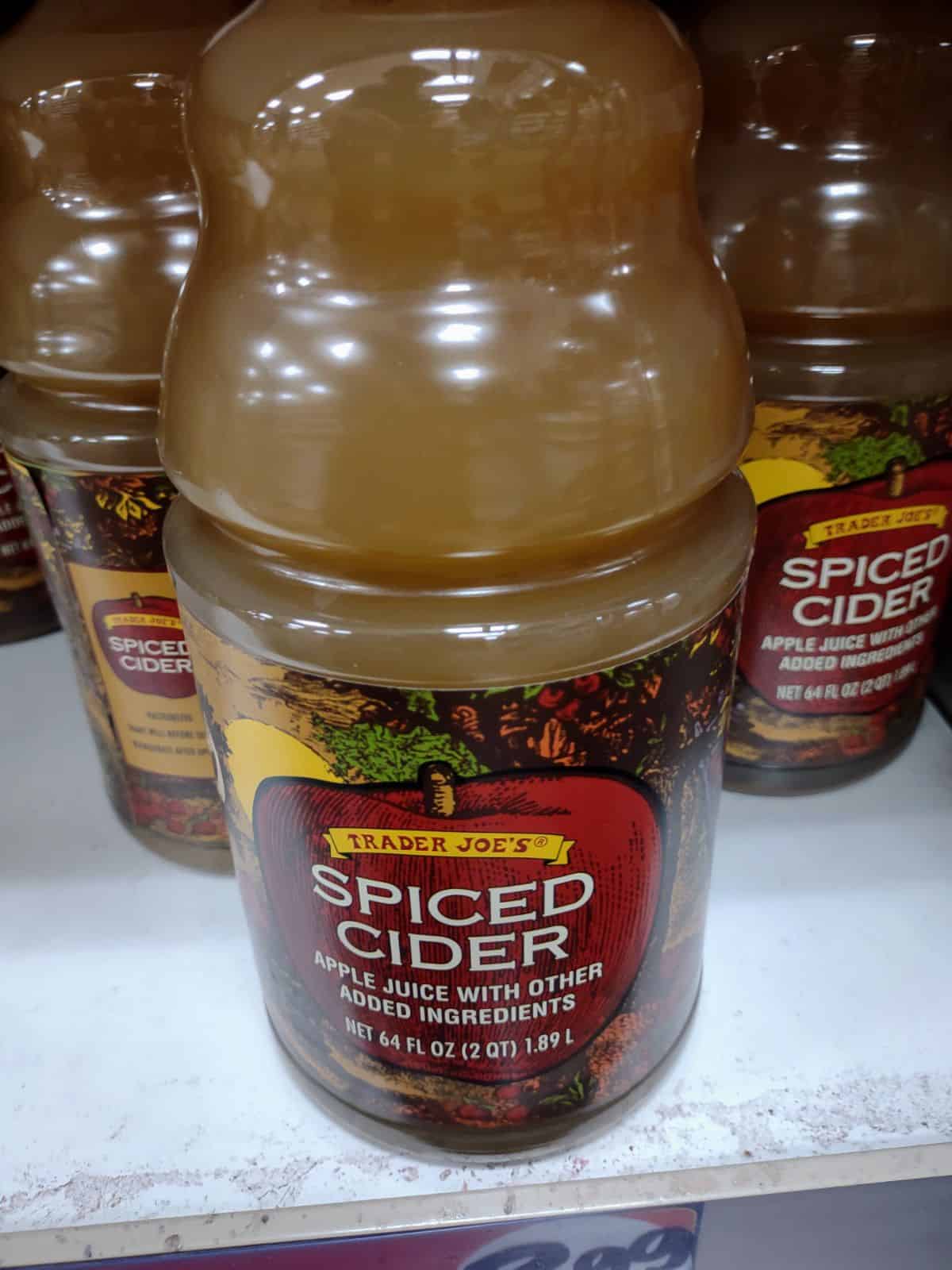 A 64 ounce container of Trader Joe's Spiced Apple Cider. 