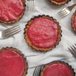Cranberry Curd in Ginger Snap Crusts with forks