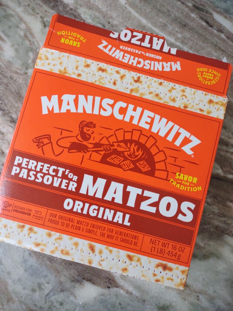 A box of Manischewitz Matzo crackers on a counter top.