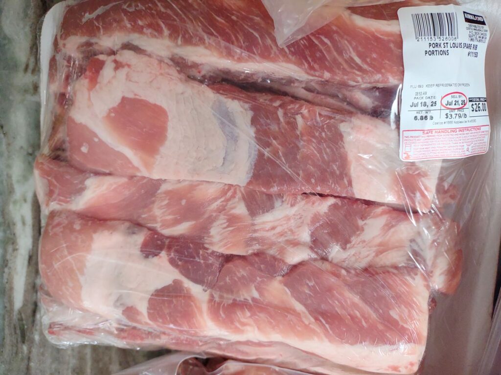 A package of St. Louis Spare Rib Portions on the counter.