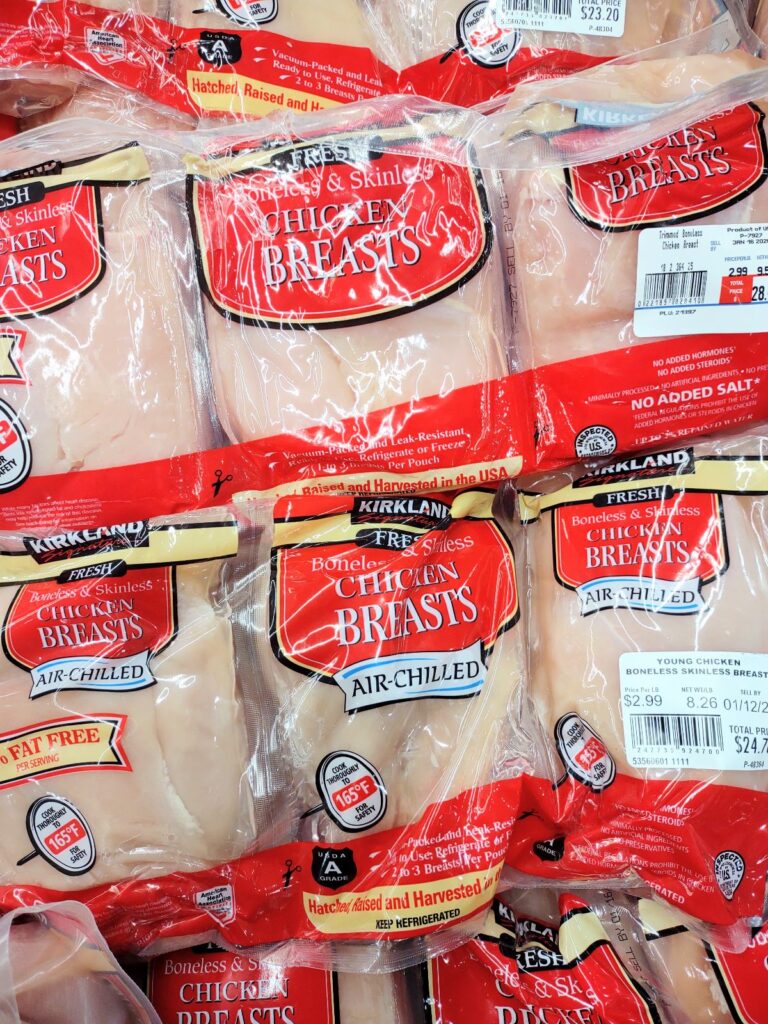 Packages of Kirkland Chicken Breasts where some are labelled air chilled and some aren't.
